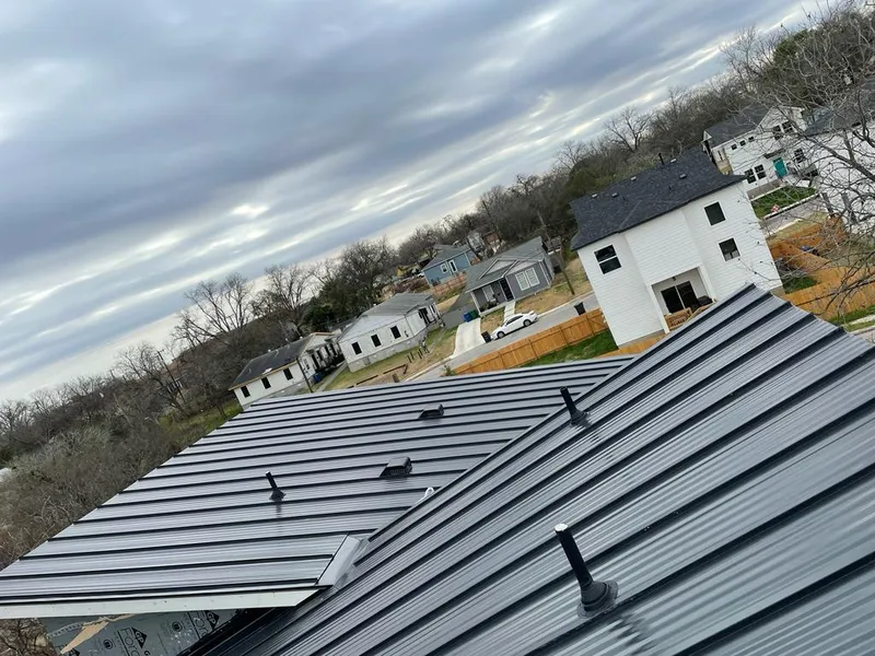 Standing seam metal roof panels with vents for Skylight Repair in Litchfield